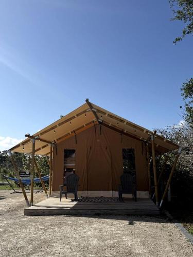 Jupiter Other | Charming Standard Safari Tent with Fire Pit Near Jonathan Dickinson State Park in Hobe Sound, Florida