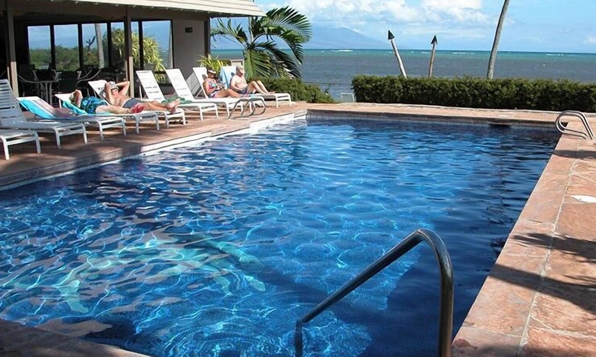 Ualapue Condo | Lovely Oceanfront Tropical Home w/Shared Pool, Free WiFi, Water Views, Lanai