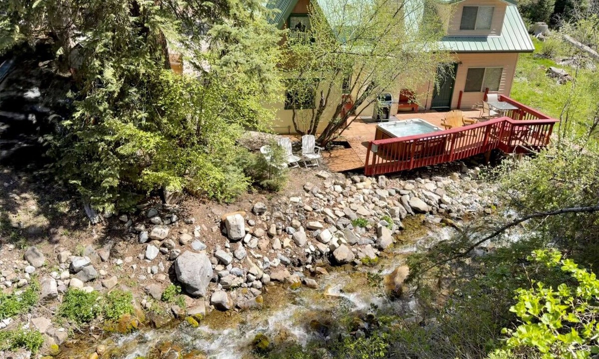 Sundance Cottage | Quiet streamside retreat Hot Tub Deck overlooking the creek Wood-burning Fireplace insert Tucked below Sundance