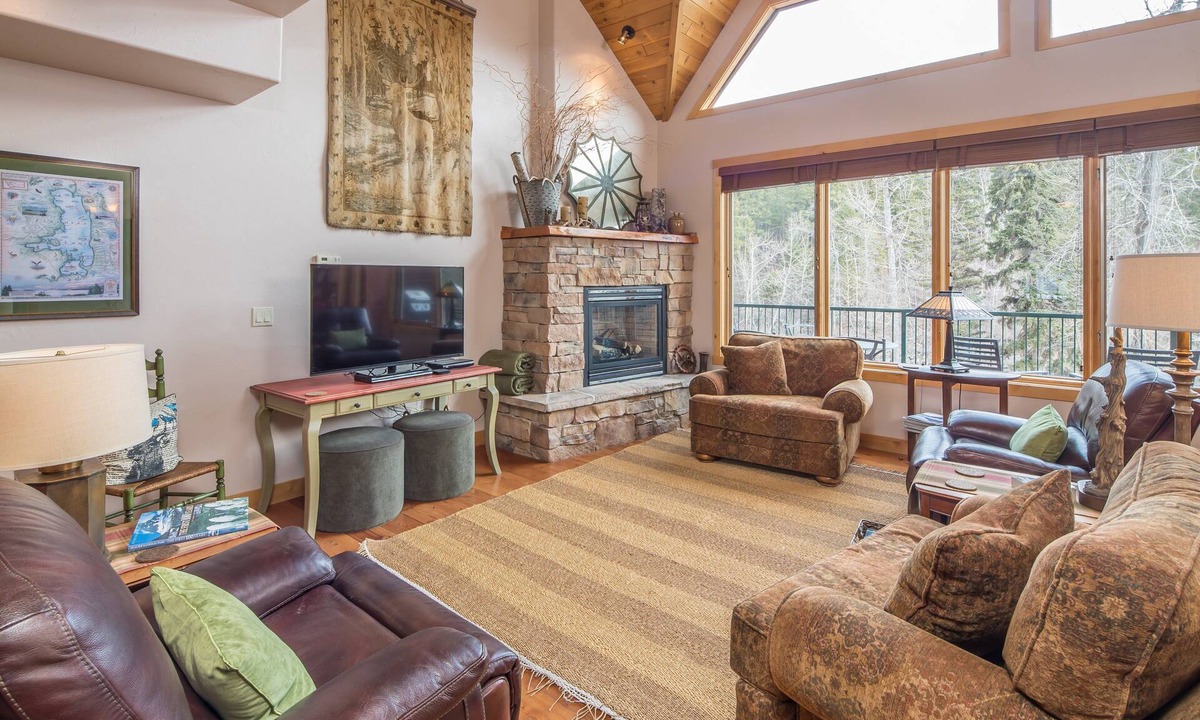 Bigfork Condo | Riverfront Bigfork Condo w/AC - Steps to Downtown, Stunning Swan River Views & Fireplace