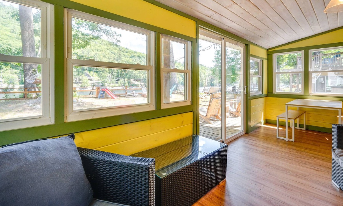 Lake Luzerne-Hadley Cottage | Riverfront Hadley Getaway w/ Fire Pit & Boat Dock!