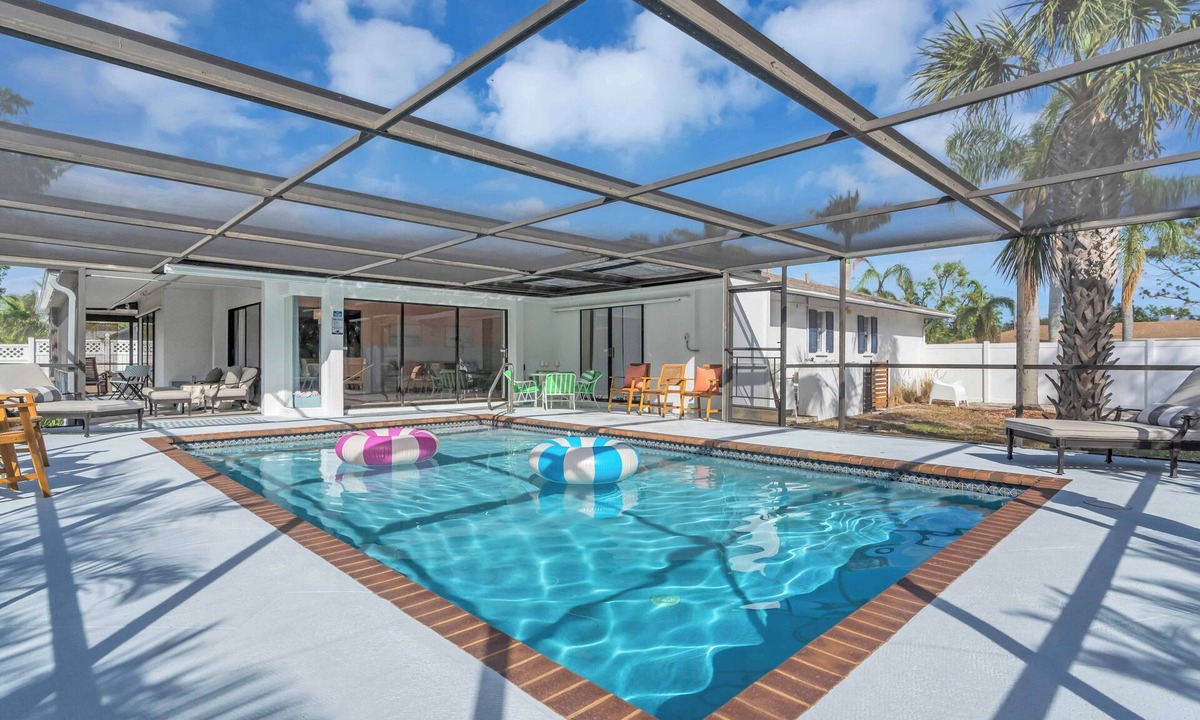 Palma Sola House | Spacious 4BR Retreat w/2 King Suites ~ Heated Saltwater Pool ~ Near AMI/IMG!