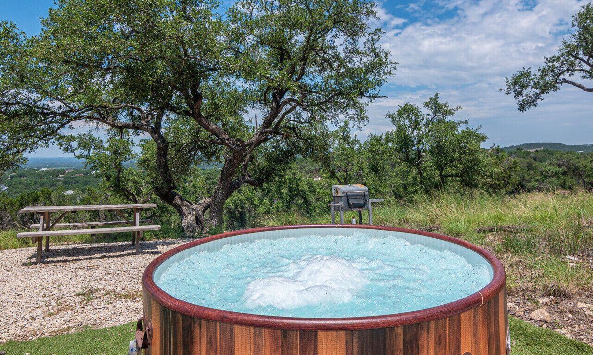 Spring Branch House | Summer Escape with Swim Hole and Golf Cart Rental