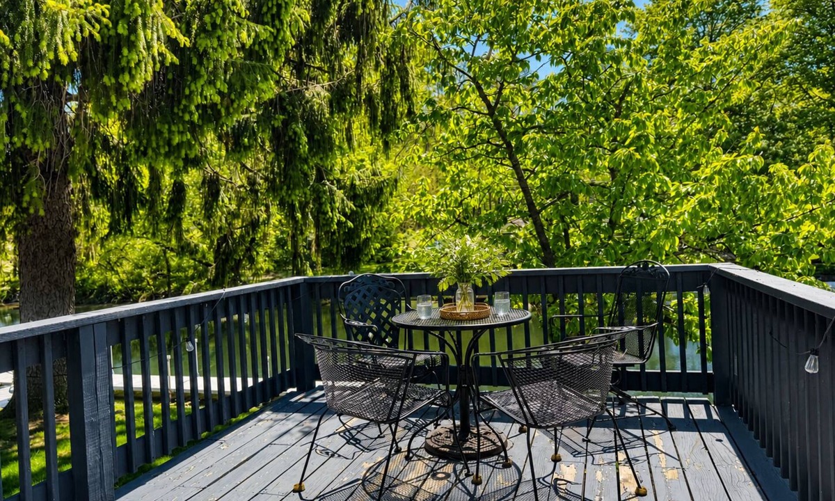 Kendall House | Wake up to peaceful lake views, launch a kayak from the dock, and unwind by the firepit at sunset. This quiet Gravel Lake retreat offers private waterfront, space to relax, and everything you need for an easy lakeside escape.