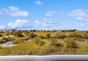 Second-Floor Condo w/Private Covered Balcony, Views, Free WiFi, and Shared Pool