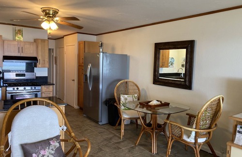 Ualapue Condo | Oceanfront, AC!, king bed, kayaks, pickleball, and beach stuff all included!