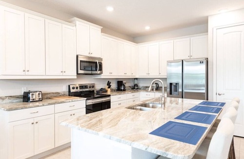 West Kissimmee Villa | 8BR Encore Villa | August Availability — Private Pool, Spa, Theater & Game Room
