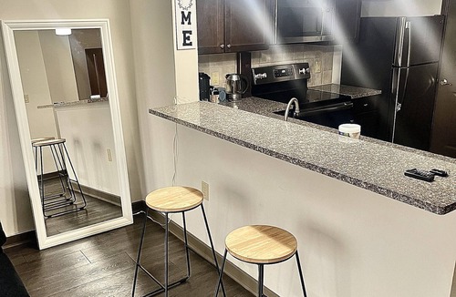 Westside Apartment | Atlanta Chic Urban Retreat Modern Apartment Stunning City Views private balcony