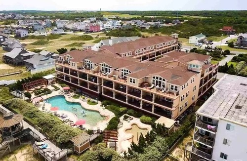 Kill Devil Hills Condo | Beachside Breeze - Pools, hot tub, & private beach access