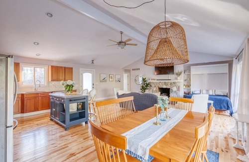 Miami Park House | Escape to our 3BR South Haven home in an exclusive community, just a 5-min walk to a private Lake Michigan beach. Comfortably sleeps 8. Features a private hot tub, chef's kitchen, and cozy fireplace. Perfect for families