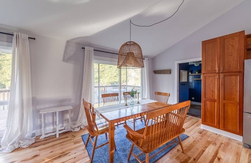 Miami Park House | Escape to our 3BR South Haven home in an exclusive community, just a 5-min walk to a private Lake Michigan beach. Comfortably sleeps 8. Features a private hot tub, chef's kitchen, and cozy fireplace. Perfect for families