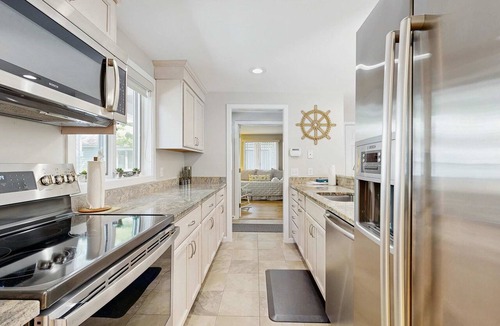 Mews Village House | Golf course-front townhouse with private heated pool & poolside patio