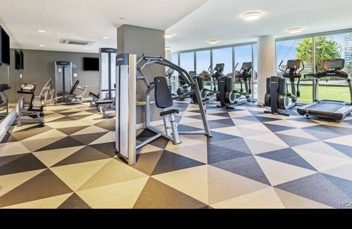 Downtown Honolulu Apartment | Luxury Condo with full view of the Ocean, Lanai, Pool, Hot Tub, Gym & Playground