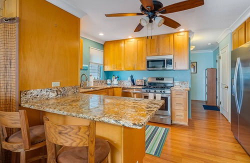 Ualapue Apartment | Ocean-view condo with private balcony, washer/dryer, & shared pool/tennis courts