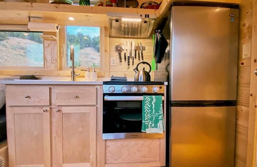 Arroyo Hondo Cabin | Rainbow Tiny Home with View & Hot Tub near Hot Springs, El Prado, NM
