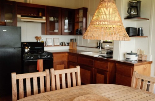 Kaunakakai Cottage | Rustic retreat with panoramic views, tropical gardens, & biodynamic produce!