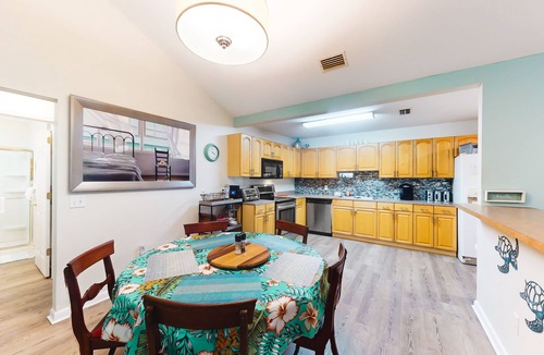 St. Augustine House | Serene home with enclosed yard, grill, games, & central AC - dog-friendly