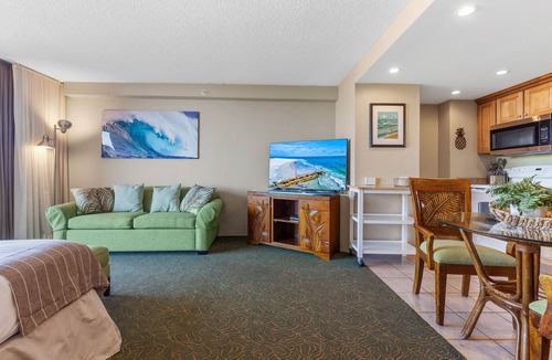 Historic Lahaina Front Street Apartment | Spacious studio with a splash of ocean view