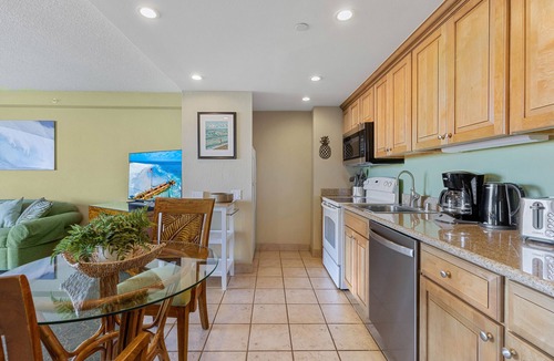 Historic Lahaina Front Street Apartment | Spacious studio with a splash of ocean view