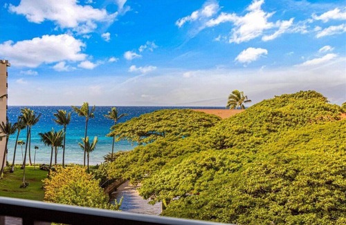 Historic Lahaina Front Street Apartment | Spacious studio with a splash of ocean view