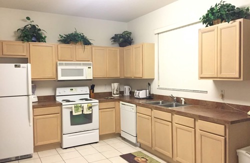 Haines City Villa | Stunning, unoverlooked, lakeside pool villa, WIFI, HDTV, GPS, 20mins to Disney