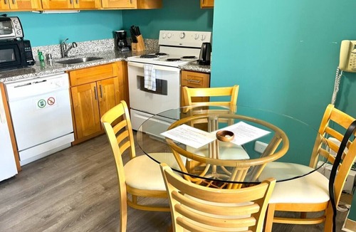 McCully - Moiliili Condo | Total of 2 bedrooms at Royal Kuhio, Sleeps 8, with AC. Two units, same floor,