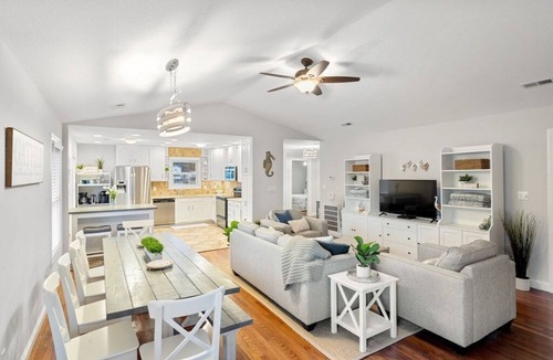Colington Harbour House | Waterfront! Hot Tub, Game Room, Kayaks, Theater Room,Fire Pit, Comm Pool,Dogs OK