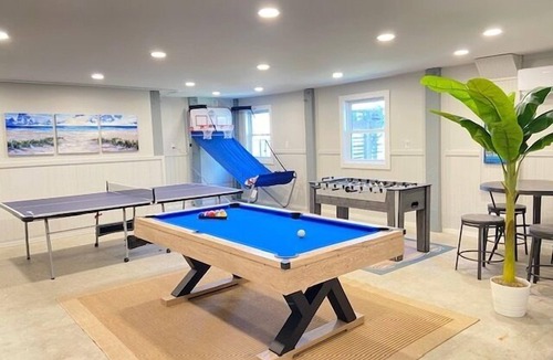 Colington Harbour House | Waterfront! Hot Tub, Game Room, Kayaks, Theater Room,Fire Pit, Comm Pool,Dogs OK