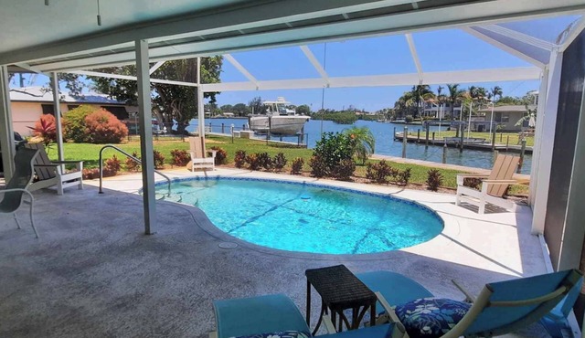 Family beach home! Fully renovated on water w/pool, boat dock & nearby beach