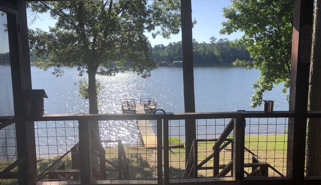 Lakefront rustic log cabin. Any season vacation, get away, or retreat.