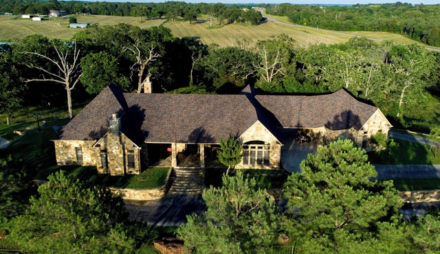 Spacious home located on 76 acres nestled on a pond.
