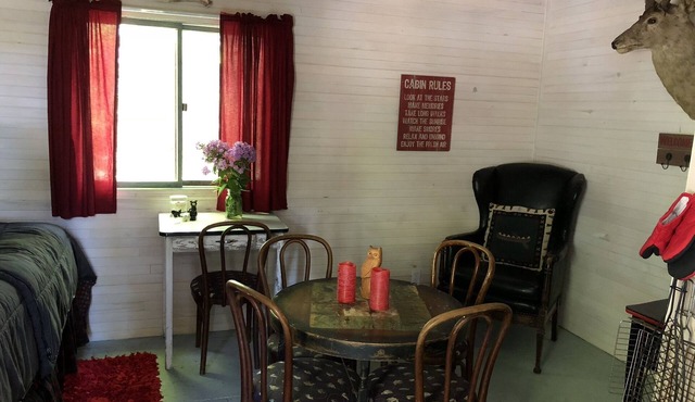 very private,adorable rustic cabin -out house , full shower house off barn
