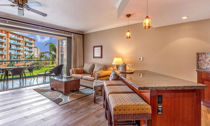 Honokowai Condo | Maui Resort Rentals: Honua Kai Konea 331 - Large Upgraded Studio w/Lush Courtyard and Peek-a-boo Ocean Views