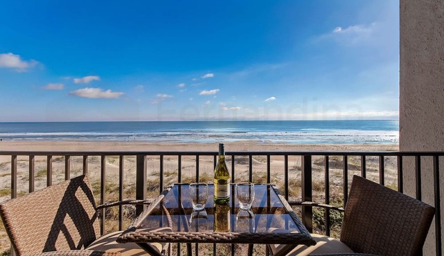 SECOND FLOOR END UNIT WITH DESIGNER TOUCHES AND FABULOUS OCEANFRONT VIEWS!