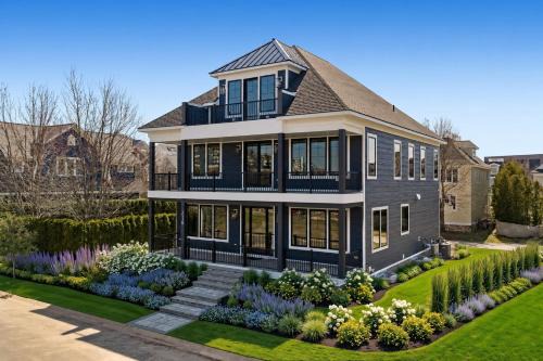 Lake-view 5BR Blue Harbor retreat with pool, beach access, and resort amenities.